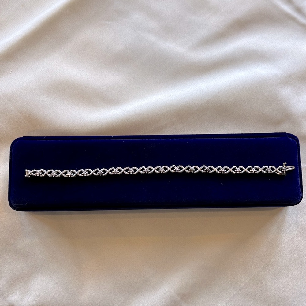 Solid stamped 925 sterling silver tennis bracelet with diamond accents